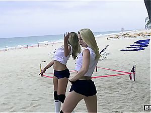 3 nubile cuties catch a huge dong on the beach